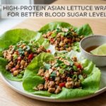 A plain dish of healthy lettuce wraps filled with seasoned ground turkey and crisp julienned vegetables.
